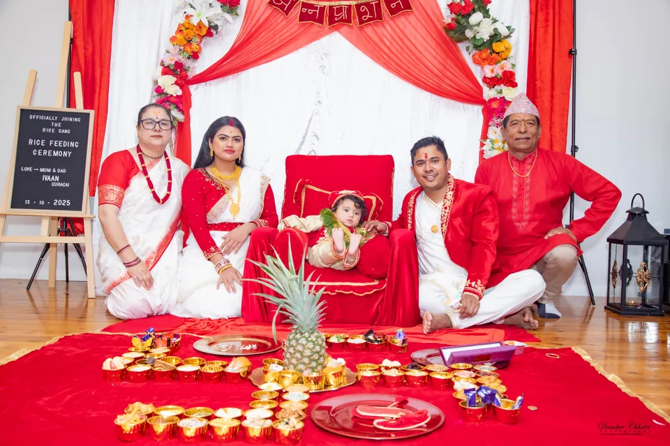 A family celebrating a traditional rice feeding ceremony